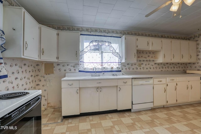 kitchen with dishwasher, white cabinetry, sink, ceiling fan, and electric range