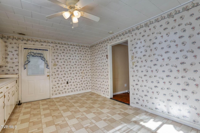 unfurnished room featuring ceiling fan