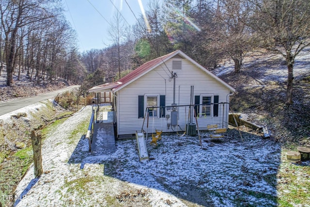 view of front of home with cooling unit