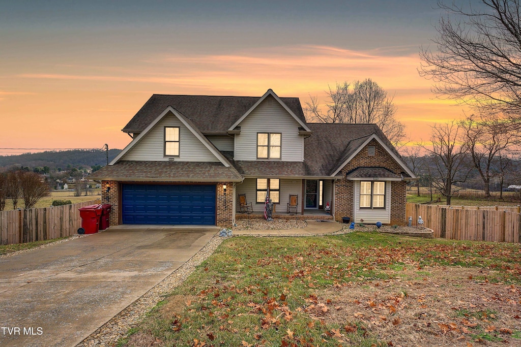 view of front of home with a garage