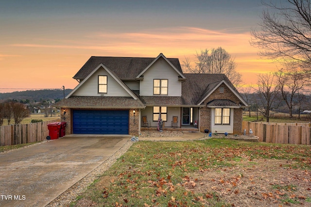 view of front of home with a garage