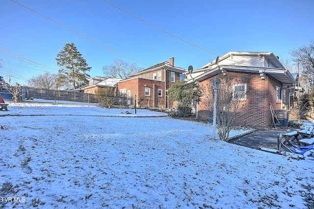 view of snow covered property