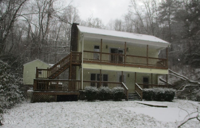 view of snow covered property