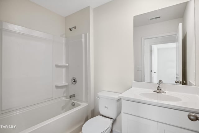 full bathroom featuring tub / shower combination, toilet, and vanity