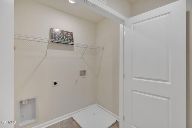 washroom featuring laundry area, hookup for a washing machine, hookup for an electric dryer, and baseboards