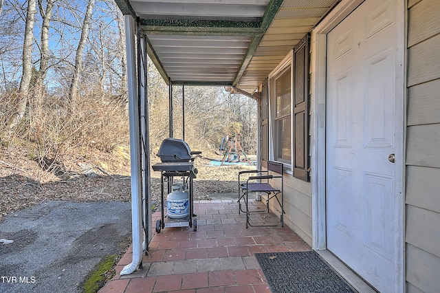 view of patio with a grill