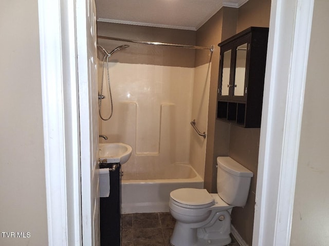 full bathroom with sink, shower / bath combination, and toilet