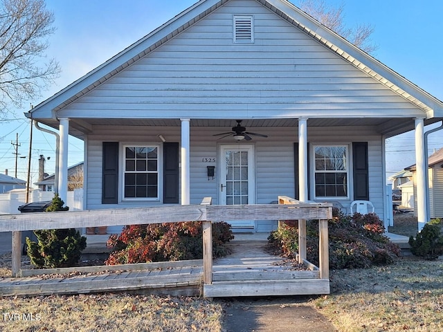 view of front of property with ceiling fan and a porch