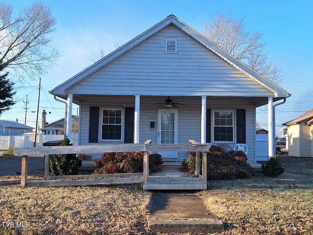 bungalow-style home with covered porch and ceiling fan