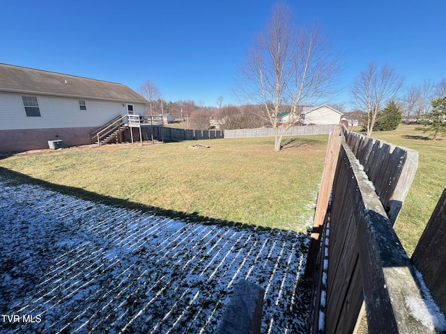 view of yard featuring a wooden deck