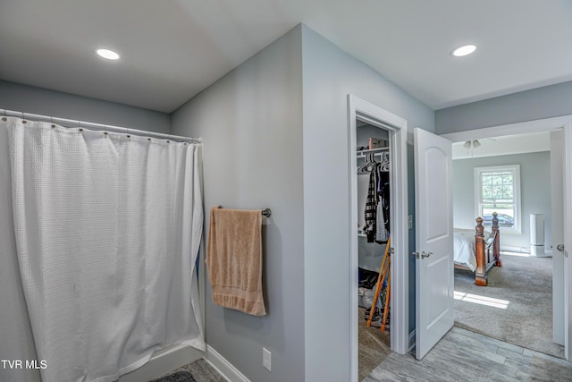 bathroom featuring hardwood / wood-style flooring