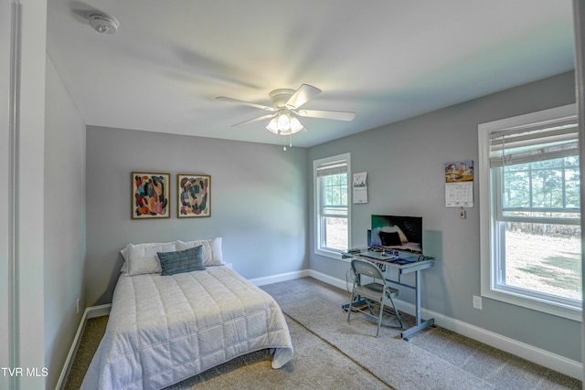 bedroom featuring ceiling fan and carpet floors