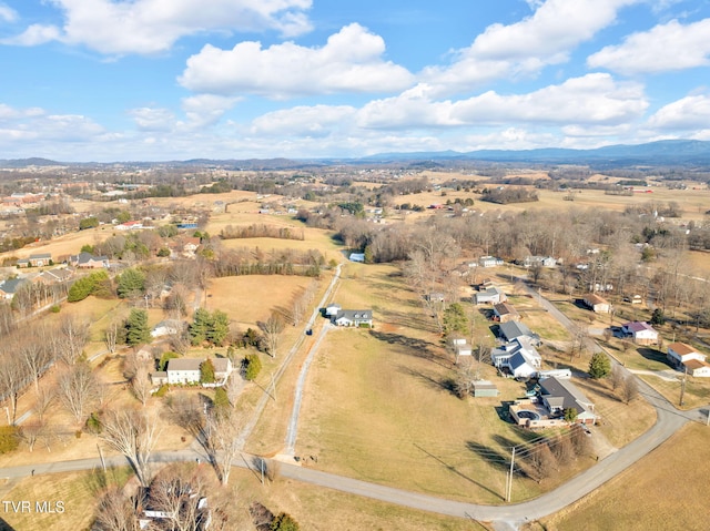 birds eye view of property with a rural view