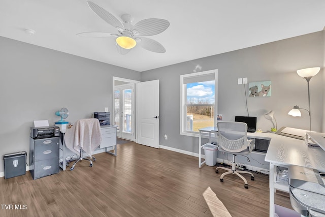 office featuring dark hardwood / wood-style flooring and ceiling fan