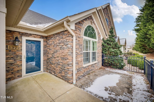 entrance to property featuring a balcony