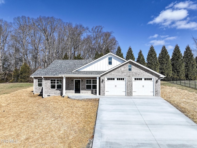 view of front facade featuring a garage and a front lawn