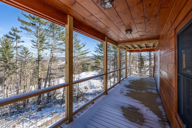 view of snow covered deck