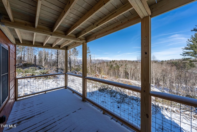 view of snow covered deck