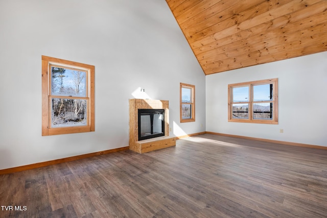 unfurnished living room with wood ceiling, high vaulted ceiling, and hardwood / wood-style floors