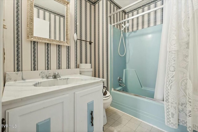 full bathroom with vanity, toilet, tile patterned flooring, and shower / bath combo