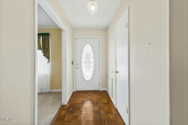 doorway featuring dark parquet floors