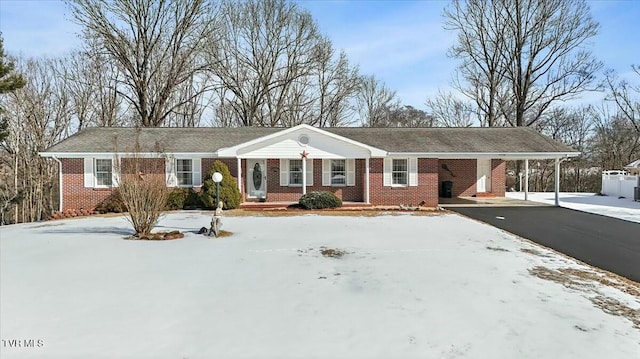 ranch-style house with a carport