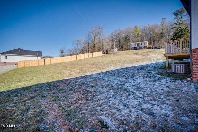 view of yard featuring a deck and cooling unit