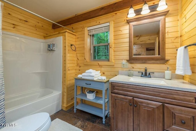 full bathroom with toilet, vanity, wooden walls, and shower / bath combo with shower curtain