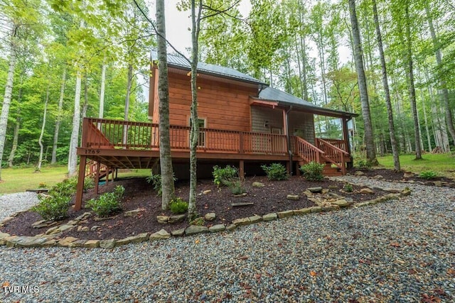 view of home's exterior with a deck