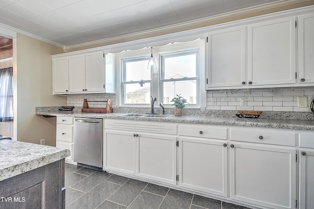 kitchen with crown molding, stainless steel dishwasher, sink, backsplash, and white cabinets