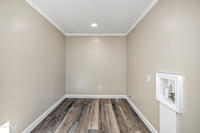 unfurnished room featuring dark wood-type flooring and crown molding