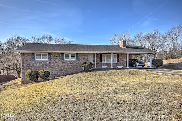 single story home with a carport and a front yard