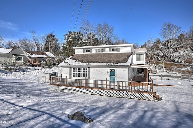 front of property featuring a deck