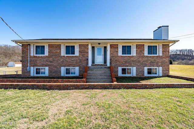 view of front of home with a front lawn