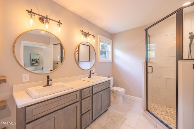 2912 W Walnut St, Johnson City, TN 37604 - bathroom with a sink, double vanity, toilet, and a shower stall