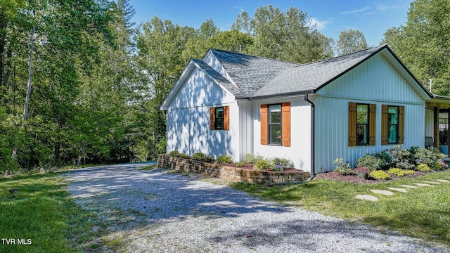 2912 W Walnut St, Johnson City, TN 37604 - view of side of home featuring roof with shingles