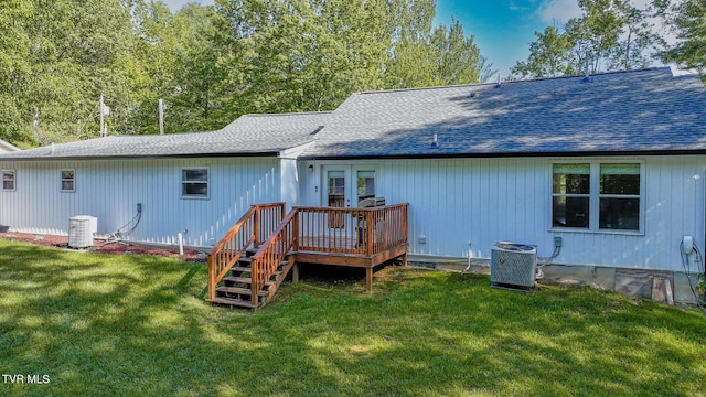 2912 W Walnut St, Johnson City, TN 37604 - back of house featuring central AC unit, a deck, a shingled roof, and a yard