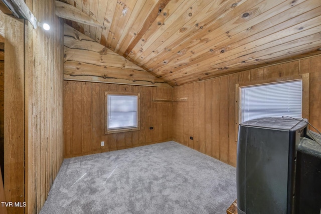 bonus room with lofted ceiling, carpet flooring, wooden ceiling, and wooden walls