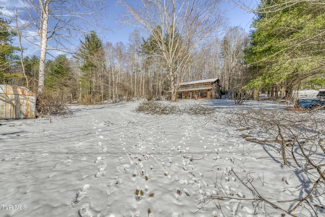 view of snowy yard