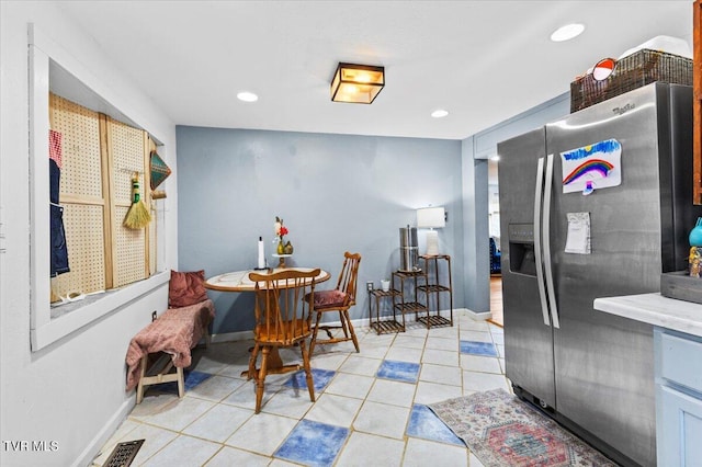 dining area with baseboards, light tile patterned flooring, visible vents, and recessed lighting