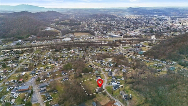 drone / aerial view featuring a mountain view