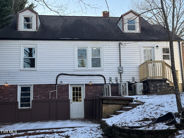 view of snow covered property