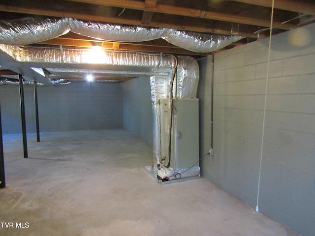 unfinished basement with heating unit