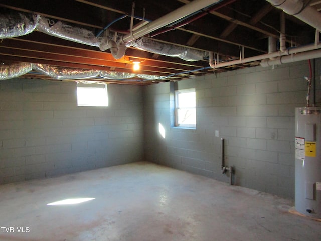 below grade area featuring water heater