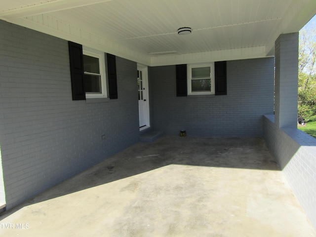 view of patio / terrace featuring a carport