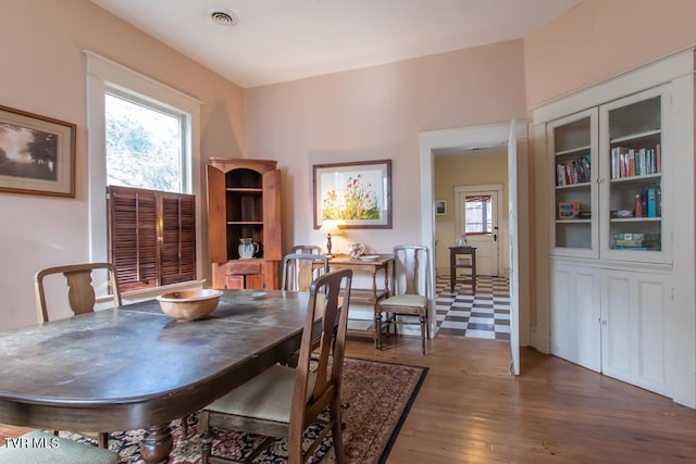 dining space featuring hardwood / wood-style floors