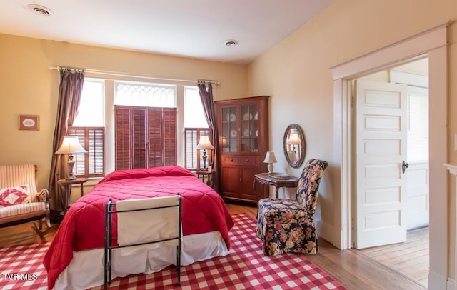 bedroom featuring light wood-type flooring