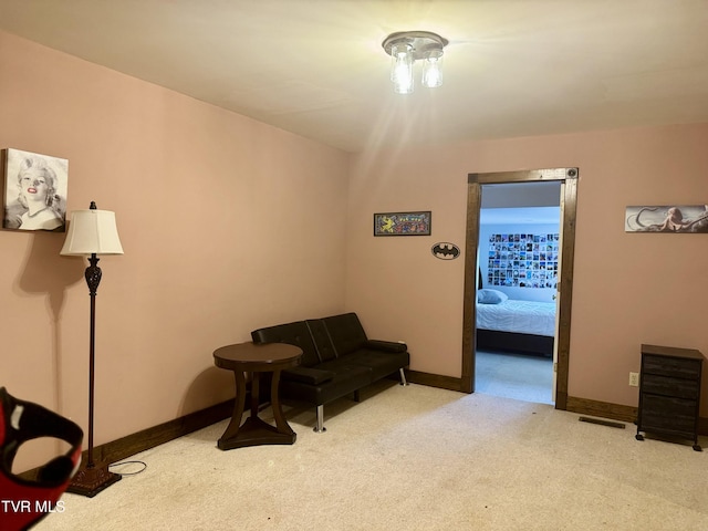 sitting room with light carpet