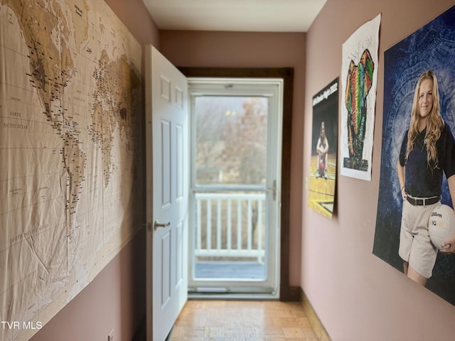 doorway featuring light parquet floors