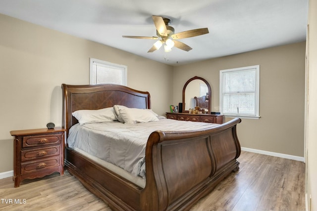 bedroom featuring ceiling fan and light hardwood / wood-style flooring